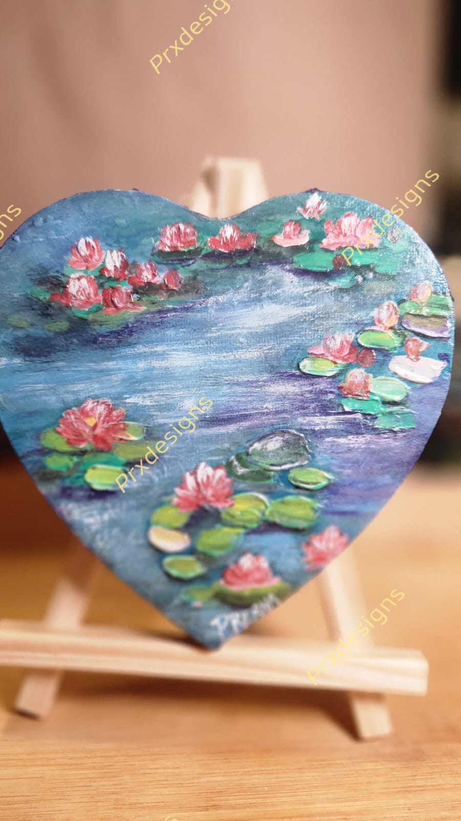 Lotus in Corazon <br>14 cms (corazon)<br> Acrylic on canvas